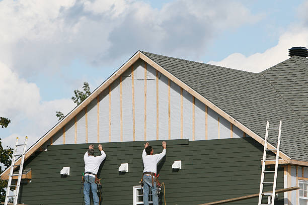 Professional Siding Installation technician working in Ellington, CT
